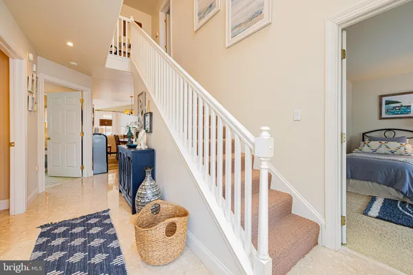 a kitchen with stainless steel appliances granite countertop a stove and cabinets