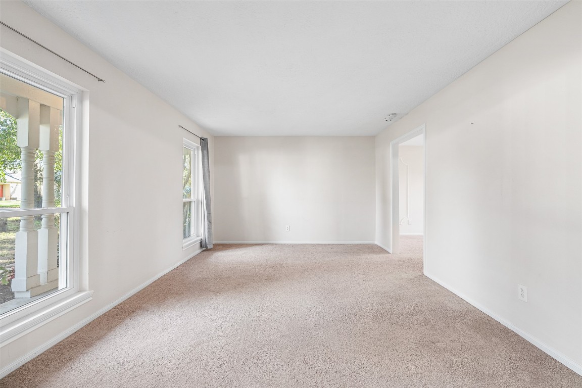 723 Shadow Brook Drive Spring, TX 77380 - Photo 11 of 44 an empty room with windows