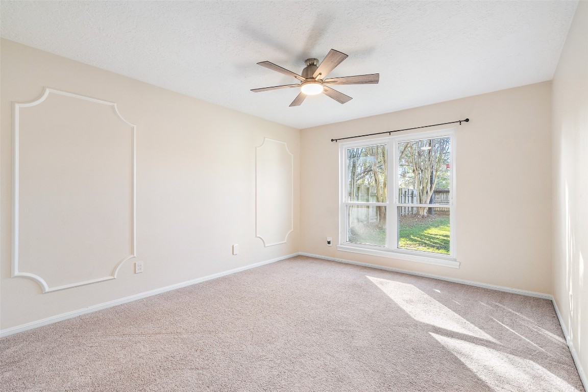 723 Shadow Brook Drive Spring, TX 77380 - Photo 13 of 44 a view of an empty room with a window