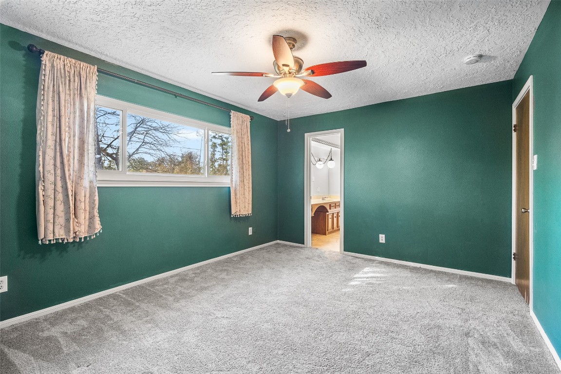 723 Shadow Brook Drive Spring, TX 77380 - Photo 28 of 44 a view of a livingroom with an empty space and a window