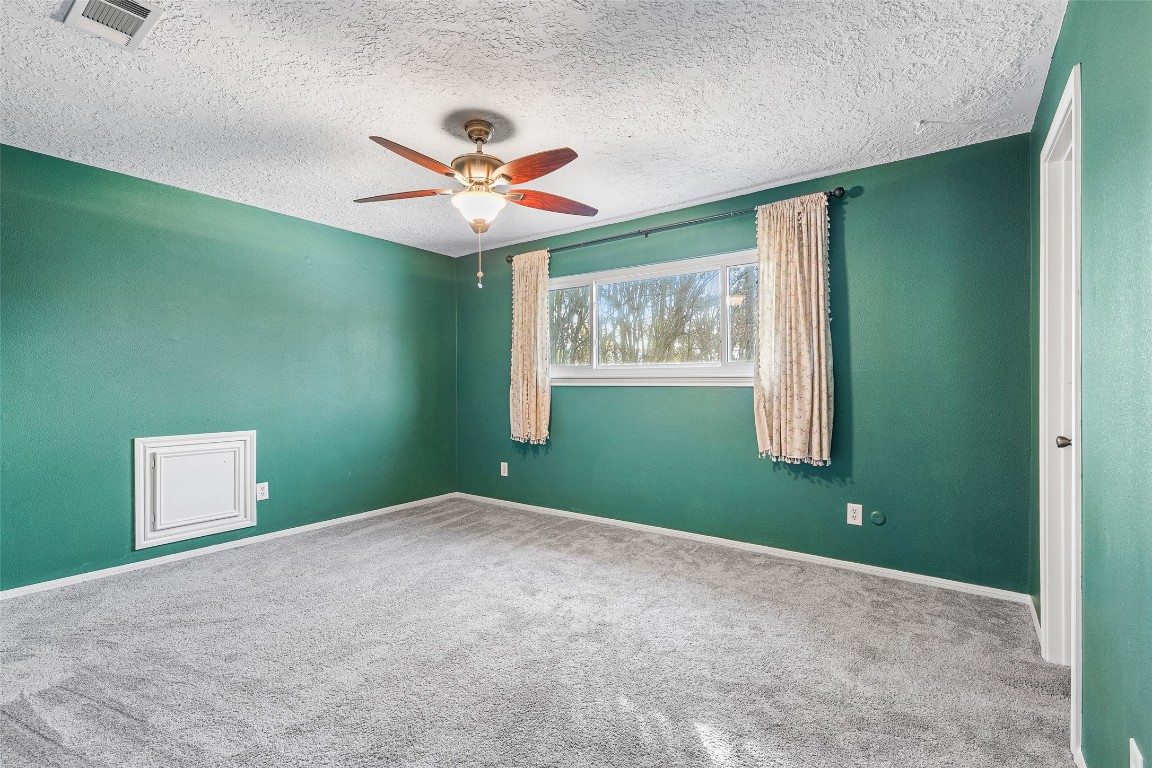 723 Shadow Brook Drive Spring, TX 77380 - Photo 29 of 44 a view of a room with a fan and a window
