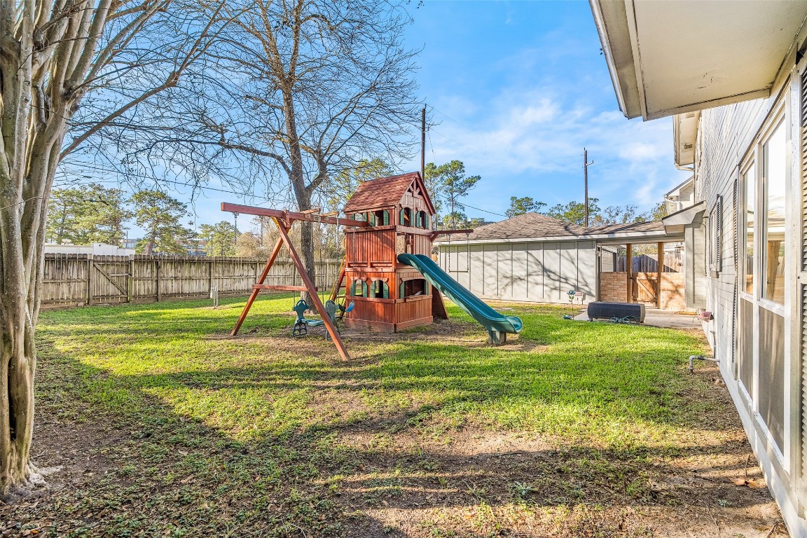 723 Shadow Brook Drive Spring, TX 77380 - Photo 35 of 44 a view of a house with a park