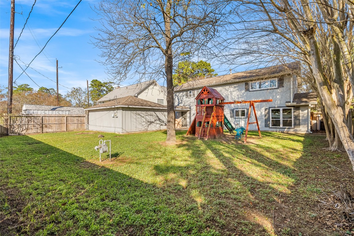 723 Shadow Brook Drive Spring, TX 77380 - Photo 36 of 44 a view of a yard with swimming pool
