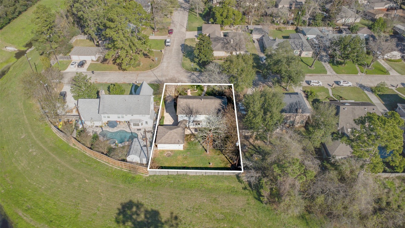 723 Shadow Brook Drive Spring, TX 77380 - Photo 41 of 44 an aerial view of a house with a yard