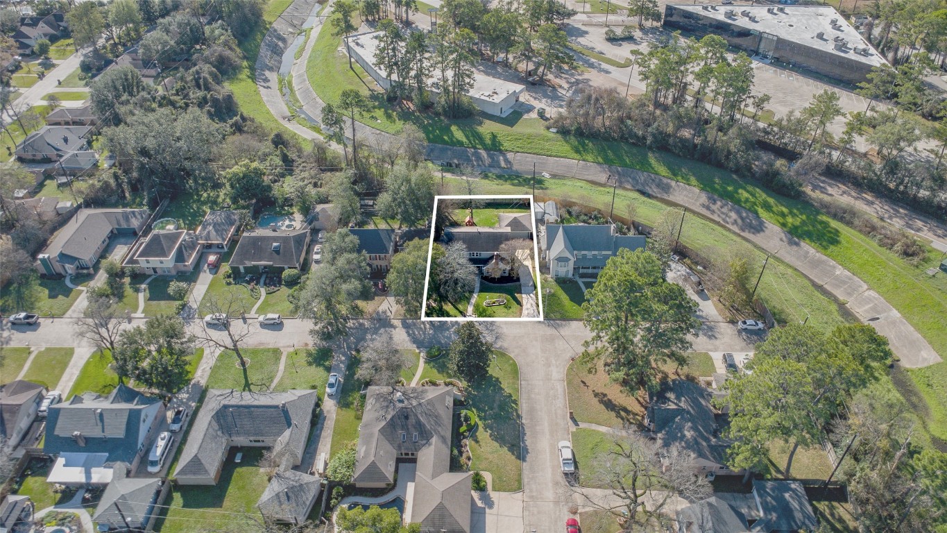 723 Shadow Brook Drive Spring, TX 77380 - Photo 43 of 44 an aerial view of a house with a yard and large trees