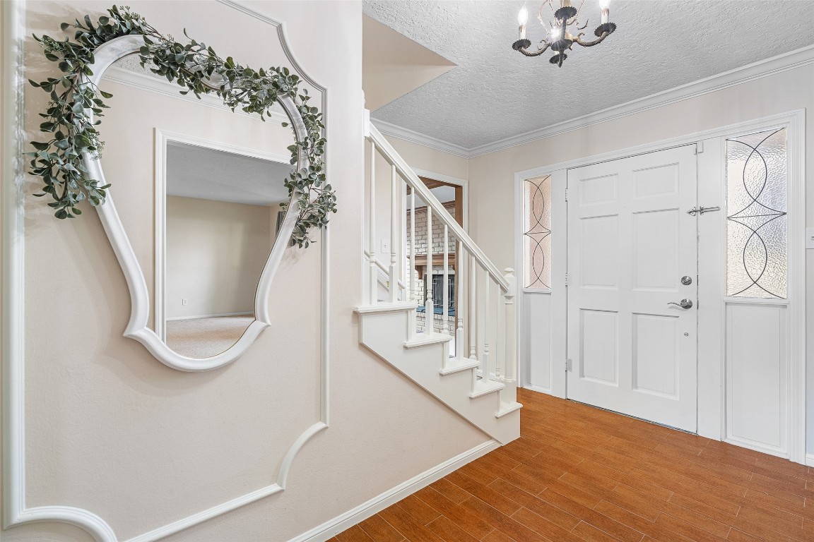 723 Shadow Brook Drive Spring, TX 77380 - Photo 5 of 44 a view of an entryway with wooden floor