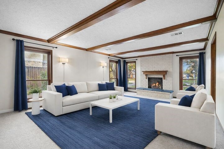 723 Shadow Brook Drive Spring, TX 77380 - Photo 6 of 44 a living room with furniture and a fireplace