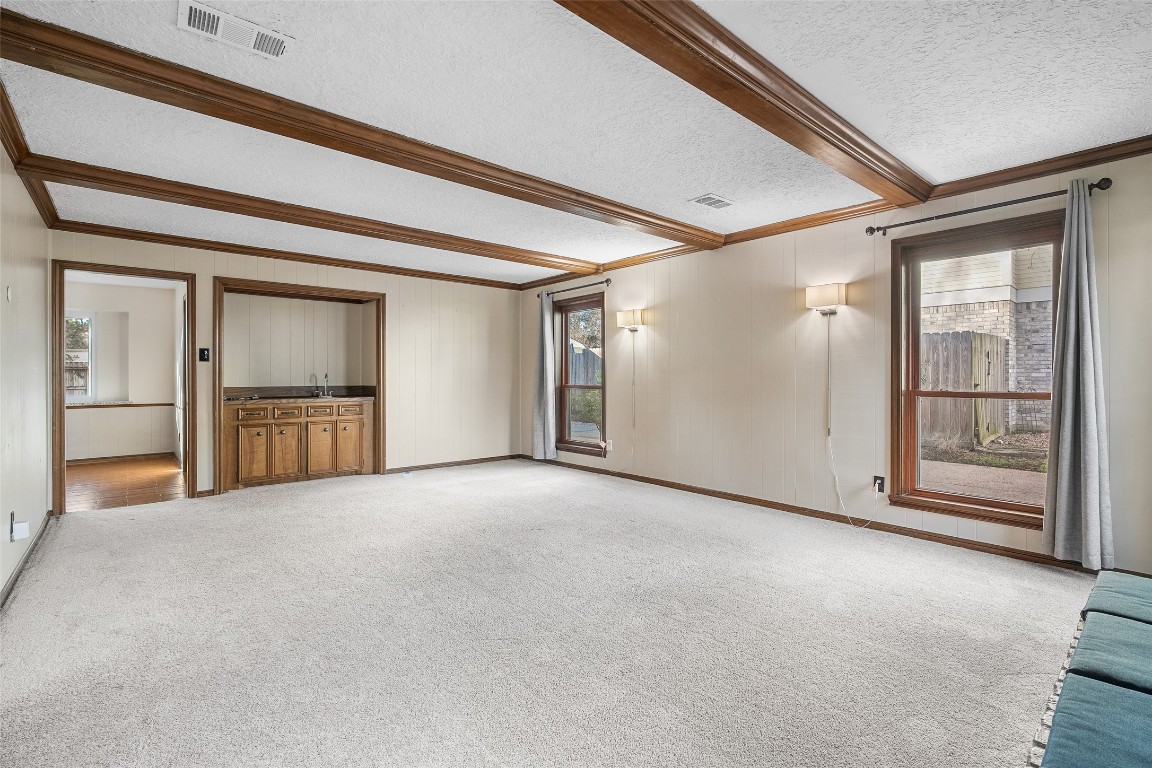 723 Shadow Brook Drive Spring, TX 77380 - Photo 8 of 44 a view of empty room with wooden floor and door