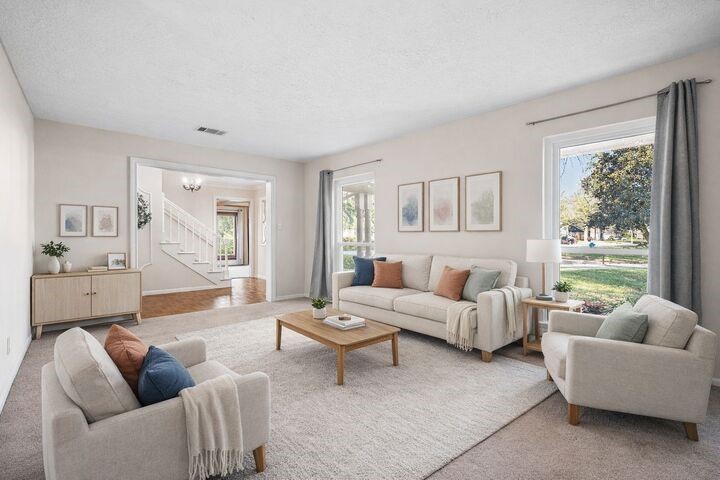 723 Shadow Brook Drive Spring, TX 77380 - Photo 9 of 44 a living room with furniture and a large window