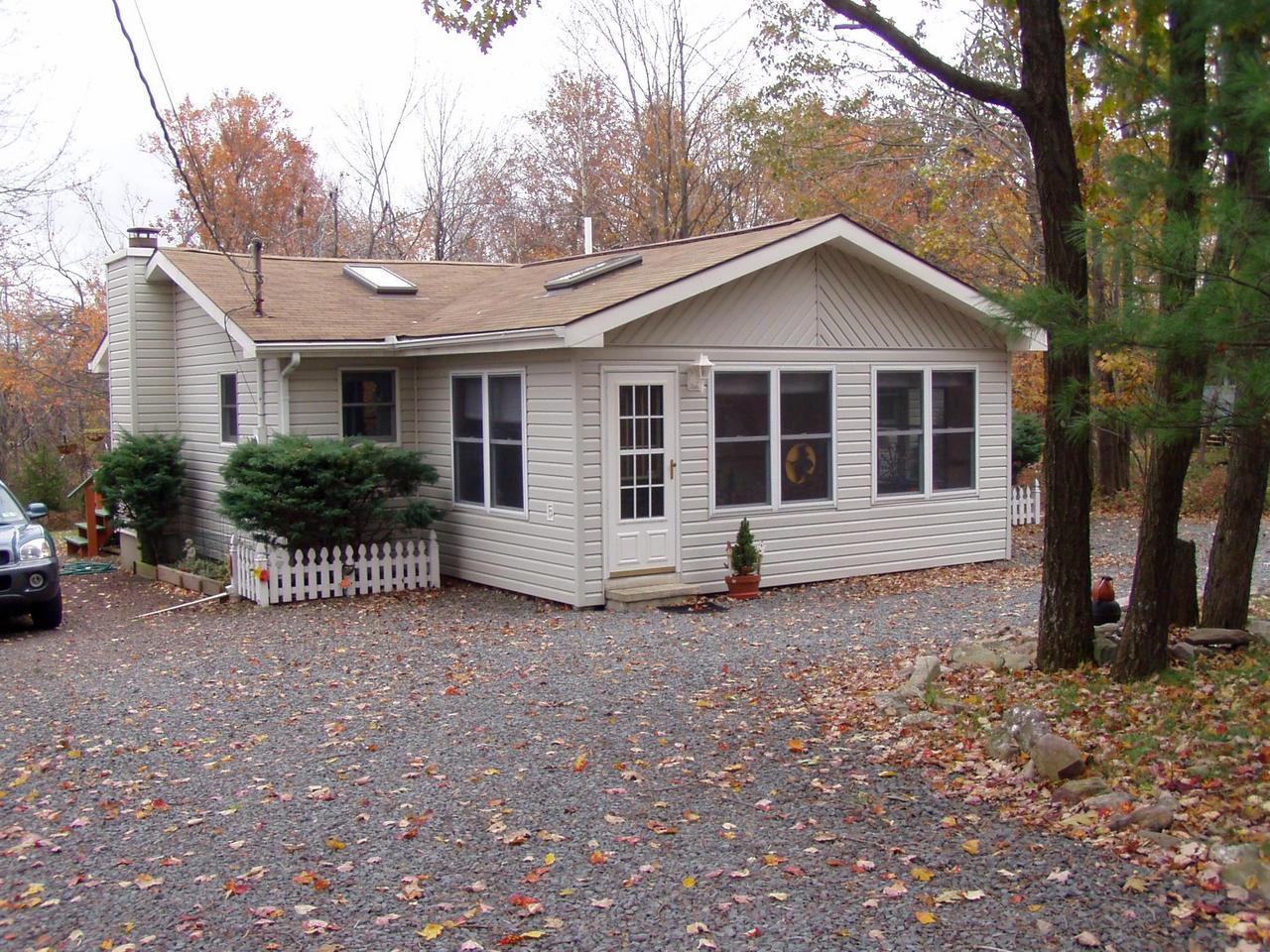 41 Crestview Road Blakeslee, PA 18610 - Photo 1 of 10 a house with trees in the background