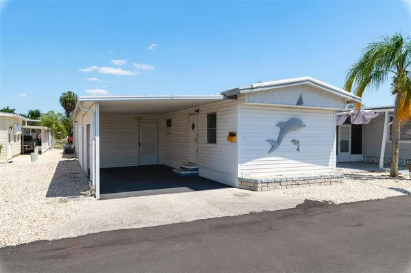 a front view of a house with a garage