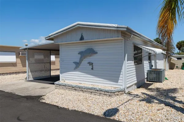 a front view of a house with a garage