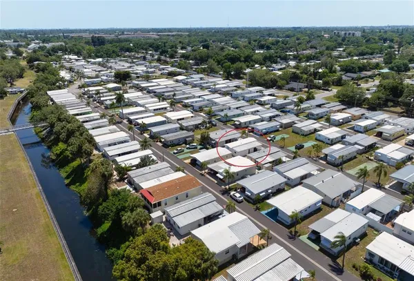 an aerial view of a city with lots of residential buildings