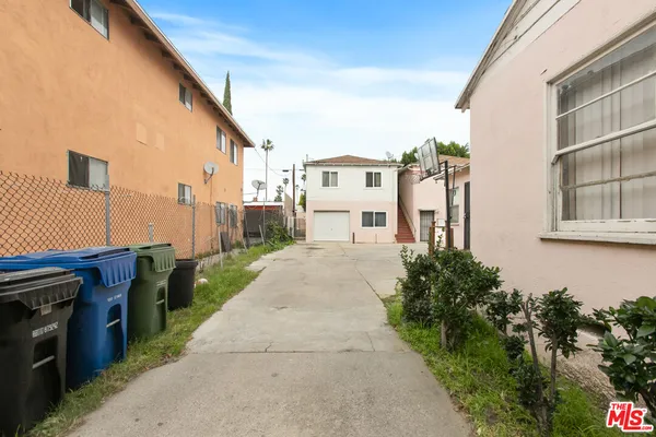 a view of a street with a houses