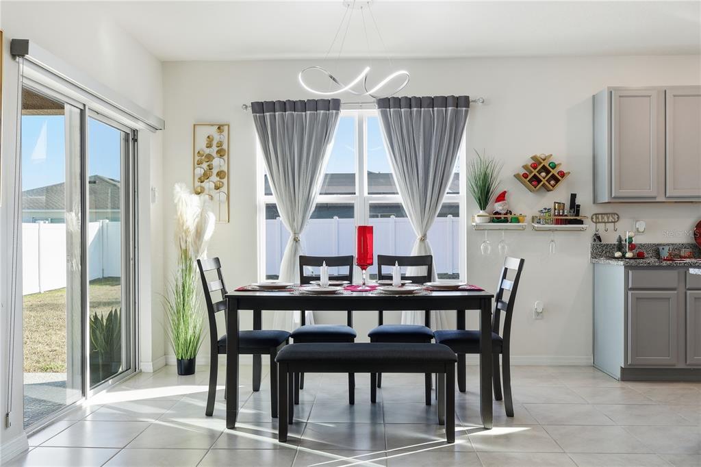 3862 Resting Robin Avenue Bartow, FL 33830 - Photo 11 of 41 a view of a dining room with furniture window and outside view