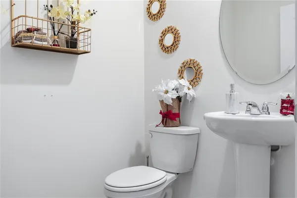 a bathroom with a shower and a glass door