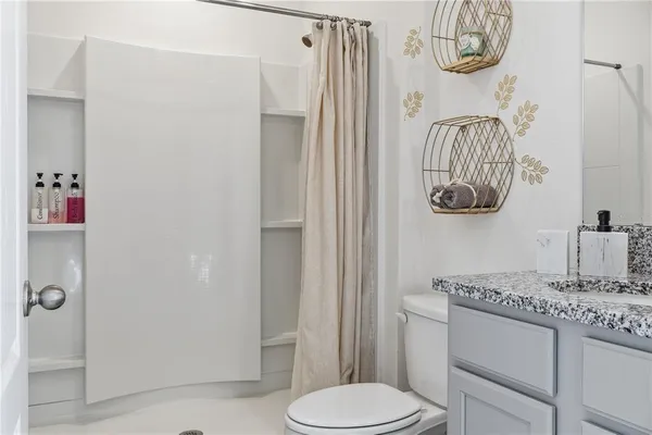 a bedroom with two large bed and a closet