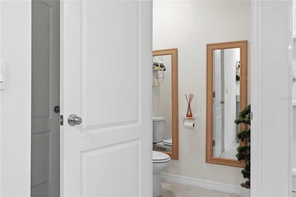 3862 Resting Robin Avenue Bartow, FL 33830 - Photo 27 of 41 a bathroom with a toilet and a shower