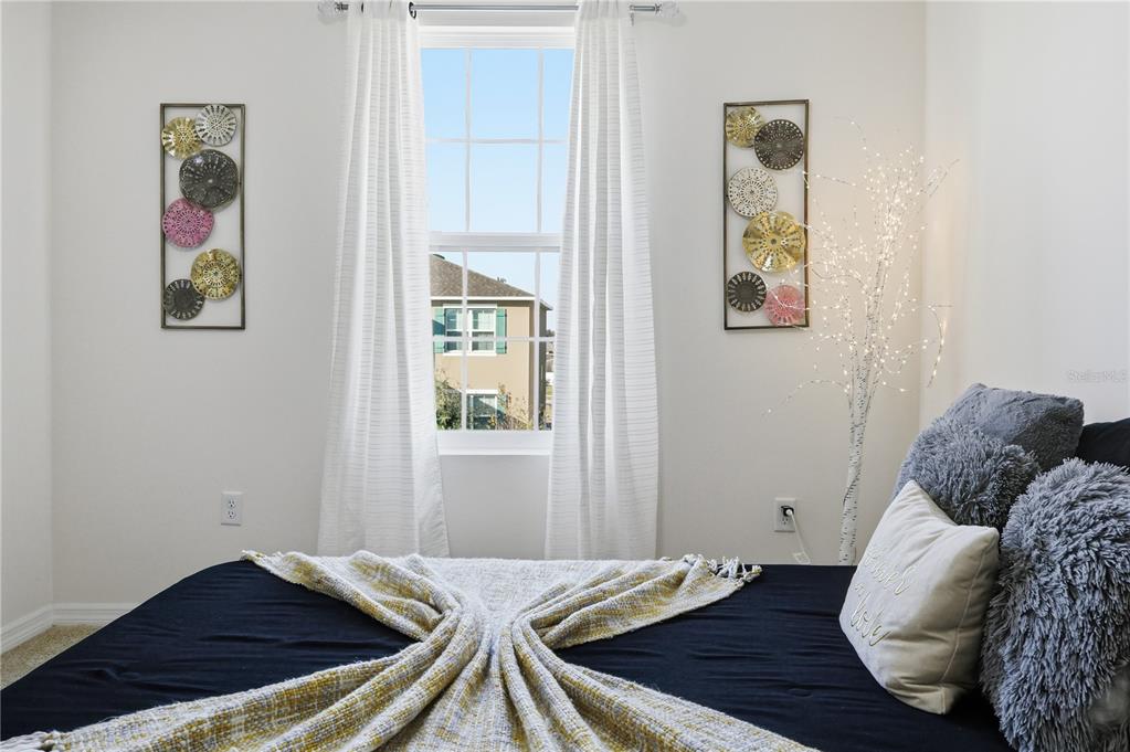 3862 Resting Robin Avenue Bartow, FL 33830 - Photo 30 of 41 a bedroom with a bed and a window