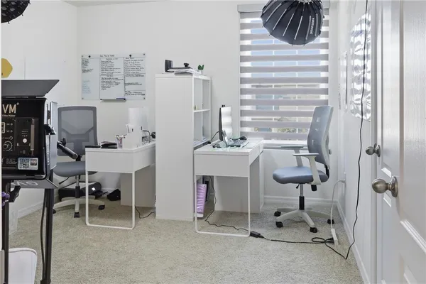 a room with furniture and a window