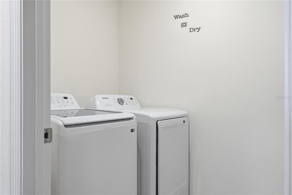 3862 Resting Robin Avenue Bartow, FL 33830 - Photo 37 of 41 a utility room with dryer and washer