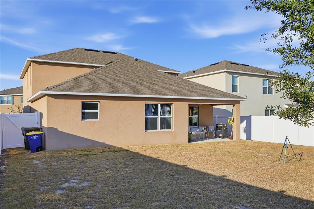 3862 Resting Robin Avenue Bartow, FL 33830 - Photo 4 of 41 a front view of a house with a yard