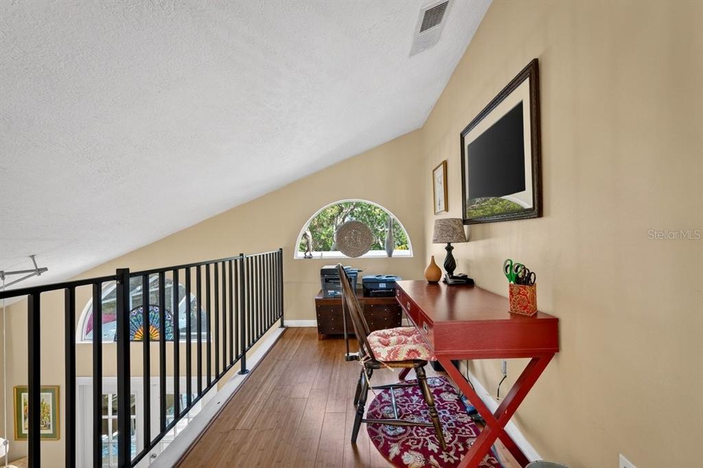 4758 South Peninsula Drive Ponce Inlet, FL 32127 - Photo 25 of 53 a view of a dining room with furniture and a window