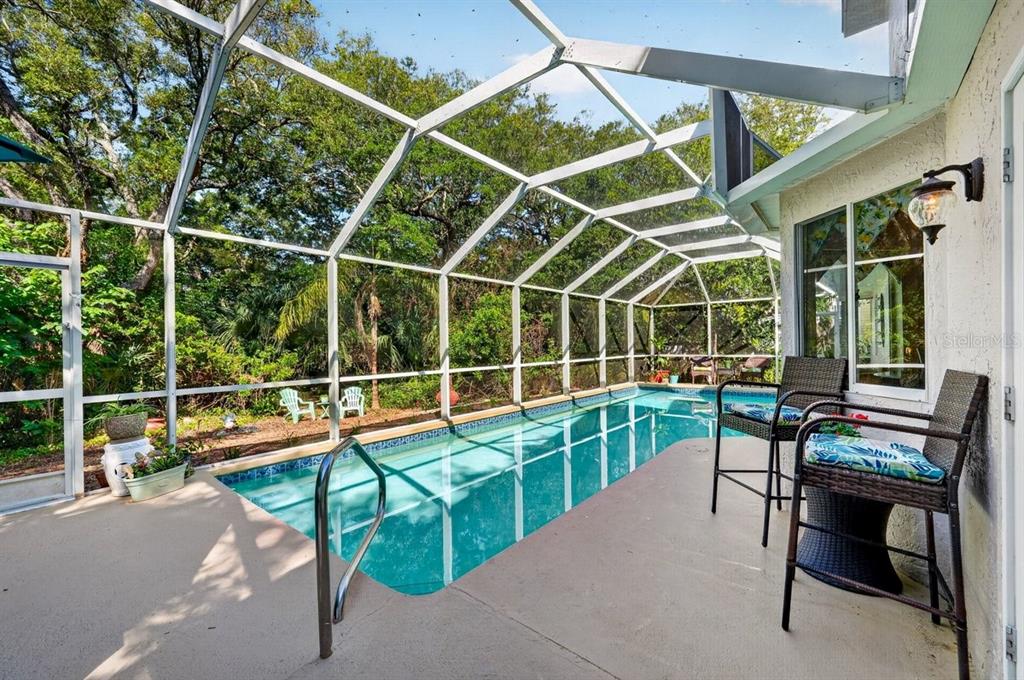 4758 South Peninsula Drive Ponce Inlet, FL 32127 - Photo 43 of 53 a garden view with a sitting space