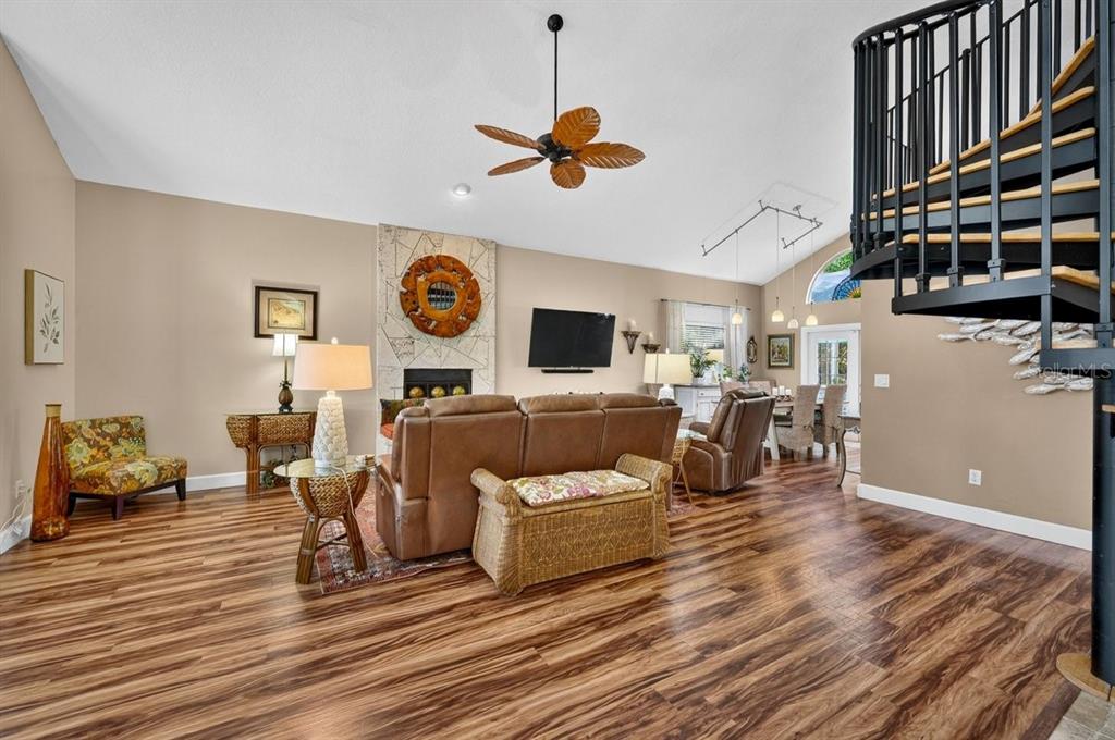 4758 South Peninsula Drive Ponce Inlet, FL 32127 - Photo 5 of 53 a living room with furniture and a flat screen tv