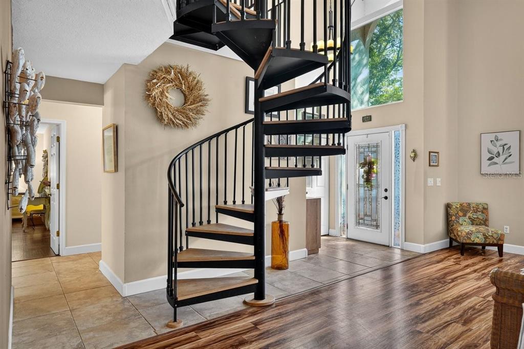 4758 South Peninsula Drive Ponce Inlet, FL 32127 - Photo 8 of 53 a view of entryway and hall with wooden floor
