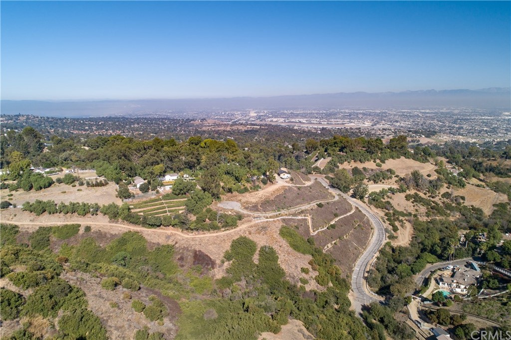 4 Poppy Trail Rolling Hills, CA 90274 - Photo 3 of 22 an aerial view of residential house and lake view