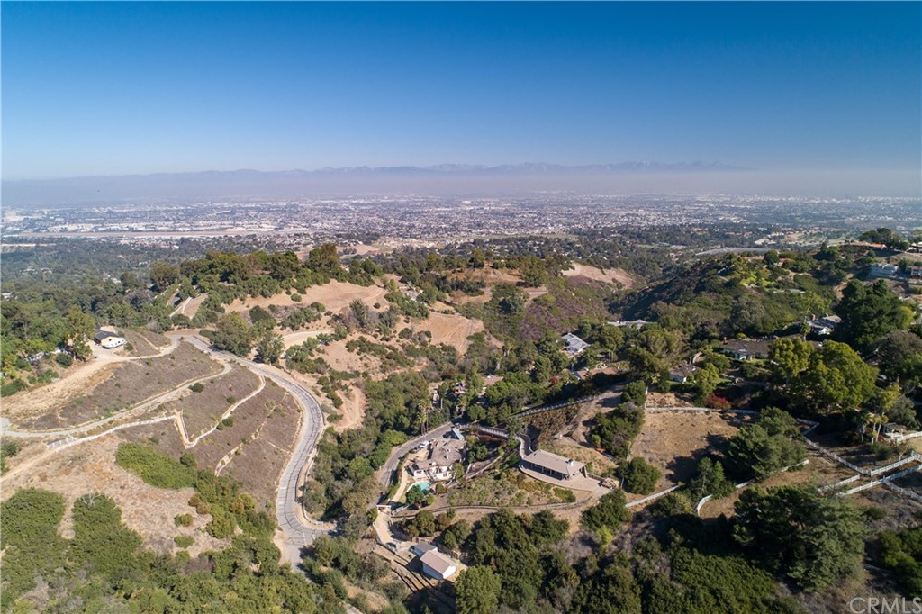 4 Poppy Trail Rolling Hills, CA 90274 - Photo 5 of 22 an aerial view of residential house with parking and yard