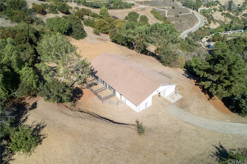 4 Poppy Trail Rolling Hills, CA 90274 - Photo 9 of 22 an aerial view of a house with a yard and greenery