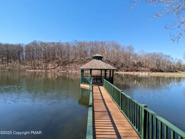 a terrace with trees in front of it