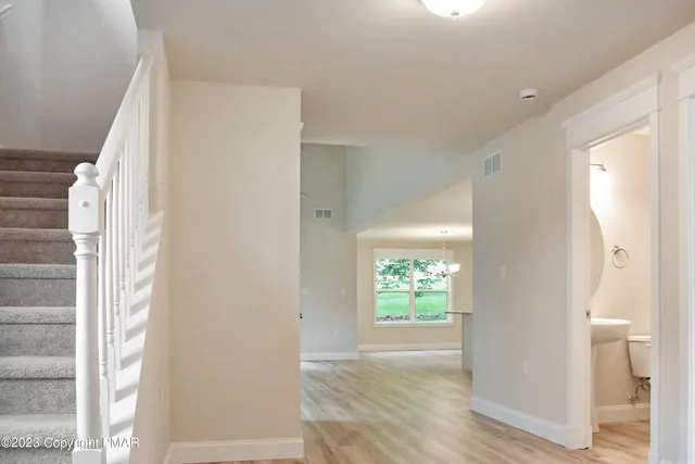 a view of an entryway with a house