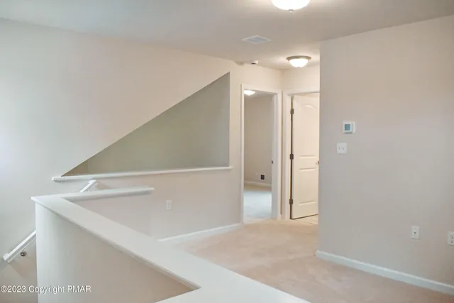 a view of a outdoor sitting area with furniture