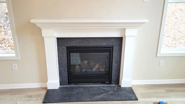 a living room with a fireplace