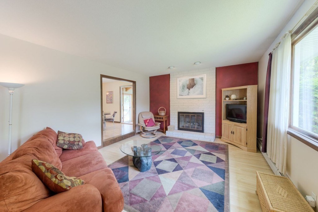 4 Hawthorne Road Wilbraham, MA 01095 - Photo 11 of 29 a living room with furniture window and a fireplace