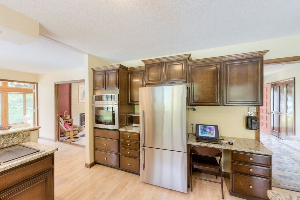 4 Hawthorne Road Wilbraham, MA 01095 - Photo 14 of 29 a kitchen with granite countertop a refrigerator stove and sink