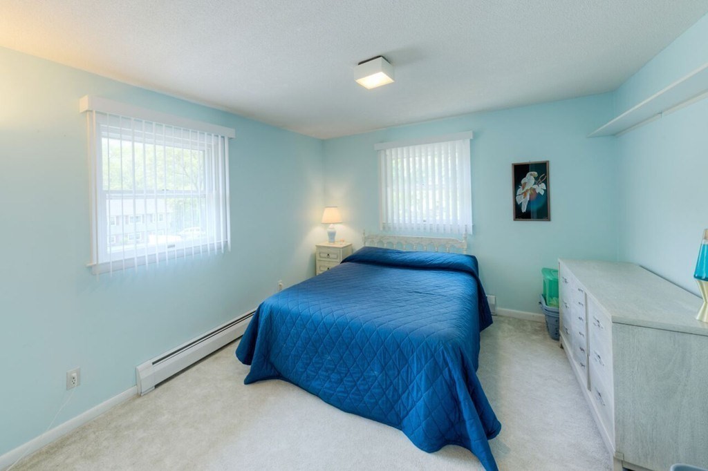 4 Hawthorne Road Wilbraham, MA 01095 - Photo 17 of 29 a bedroom with a bed and a window