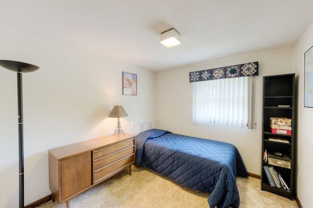 4 Hawthorne Road Wilbraham, MA 01095 - Photo 21 of 29 a bedroom with a bed and a window