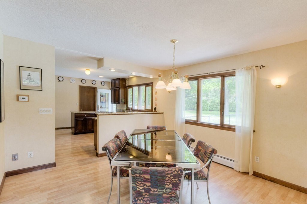 4 Hawthorne Road Wilbraham, MA 01095 - Photo 5 of 29 a view of a dining room with furniture and a window
