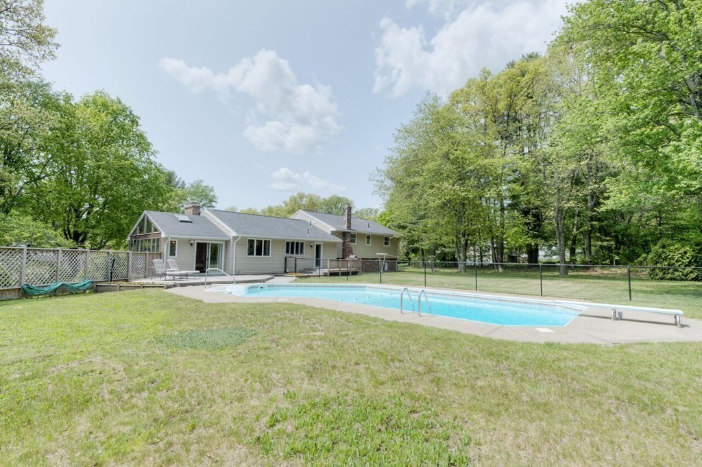 4 Hawthorne Road Wilbraham, MA 01095 - Photo 6 of 29 a view of a house with swimming pool and a yard
