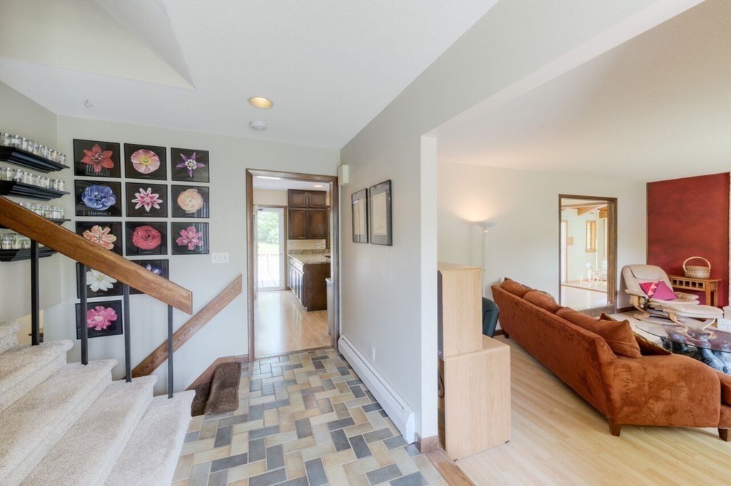 4 Hawthorne Road Wilbraham, MA 01095 - Photo 9 of 29 a living room with furniture and stairs