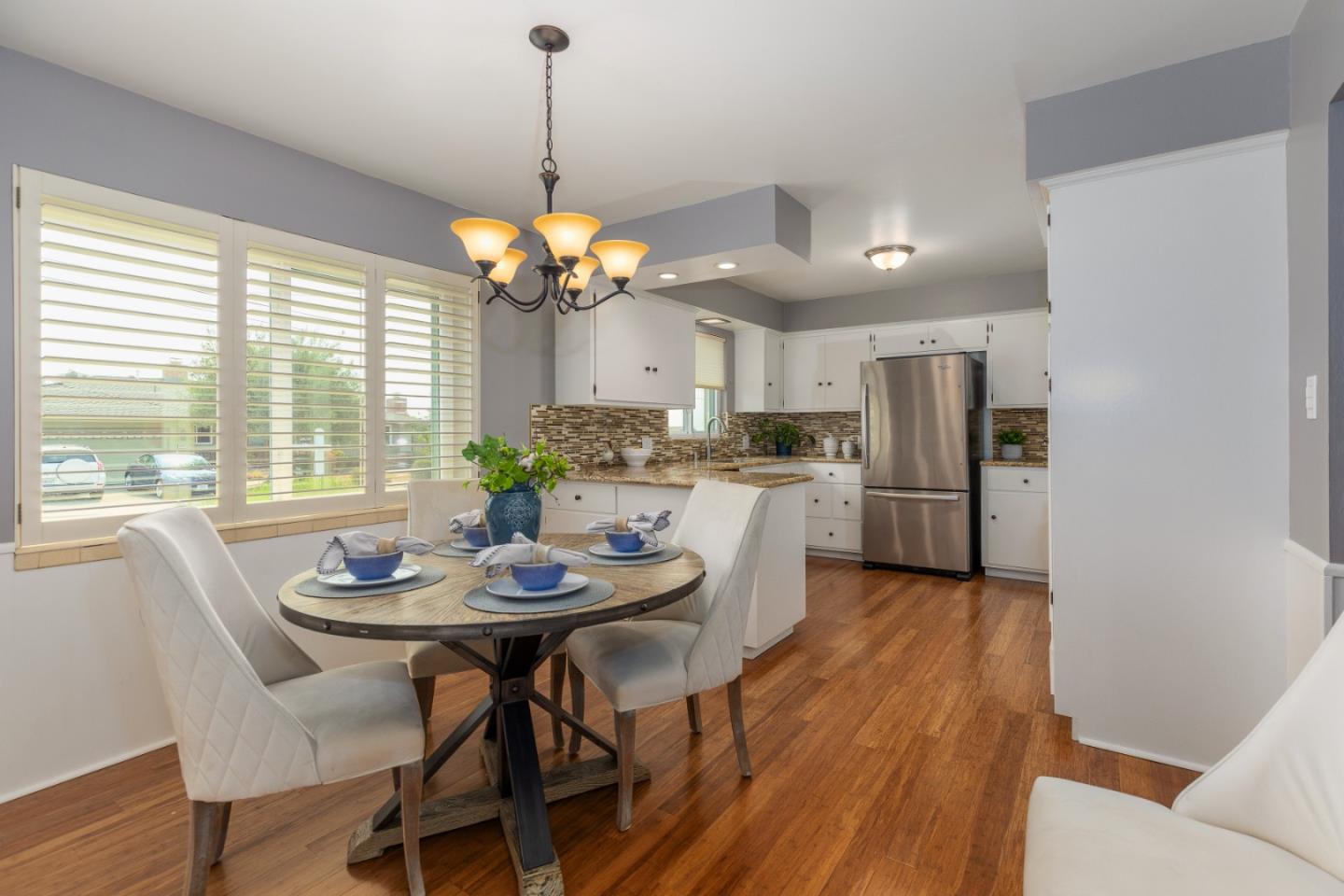 2479 Longview Drive San Leandro, CA 94577 - Photo 11 of 57 a view of a dining room with furniture large window and wooden floor