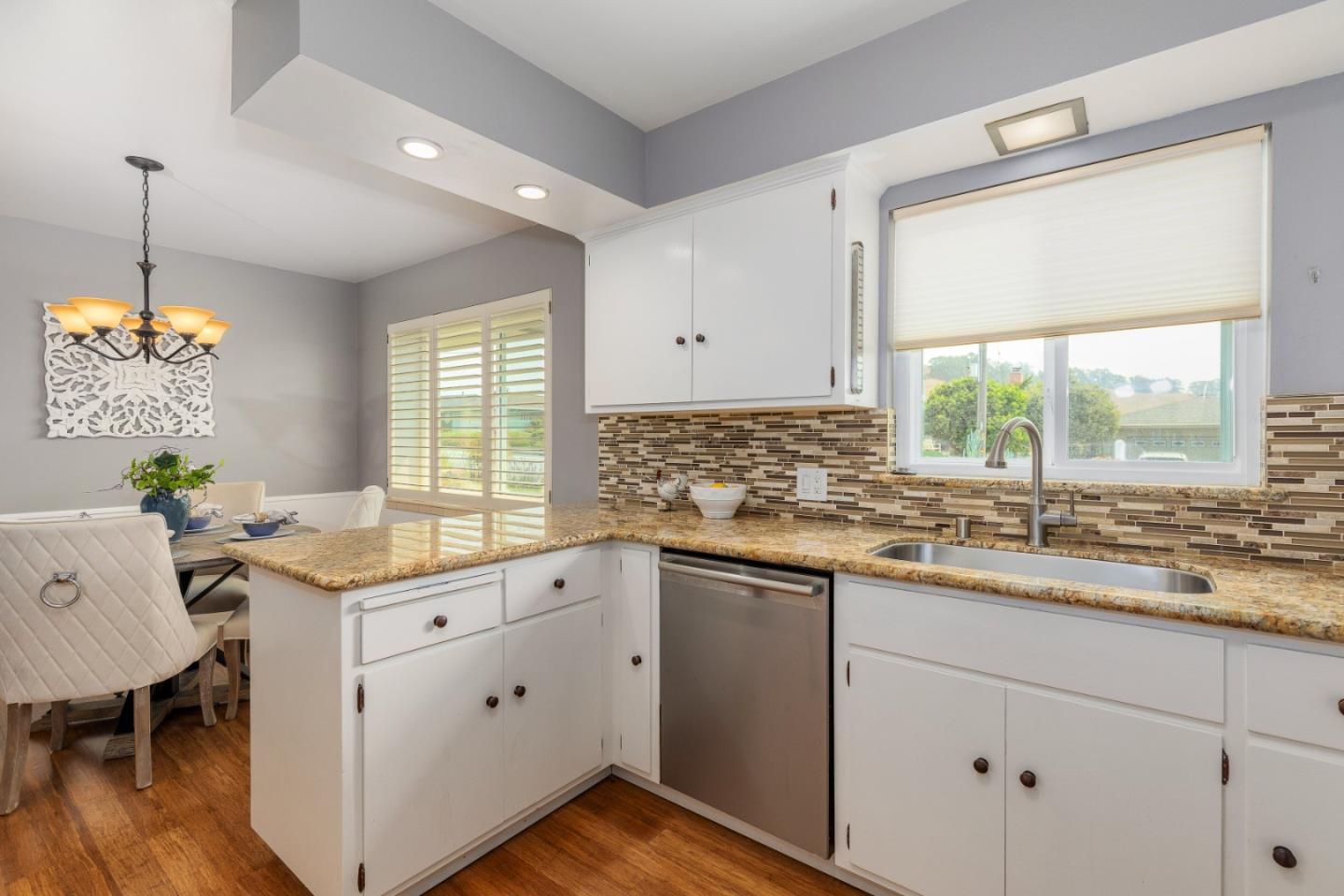 2479 Longview Drive San Leandro, CA 94577 - Photo 16 of 57 a kitchen with a sink window and cabinets