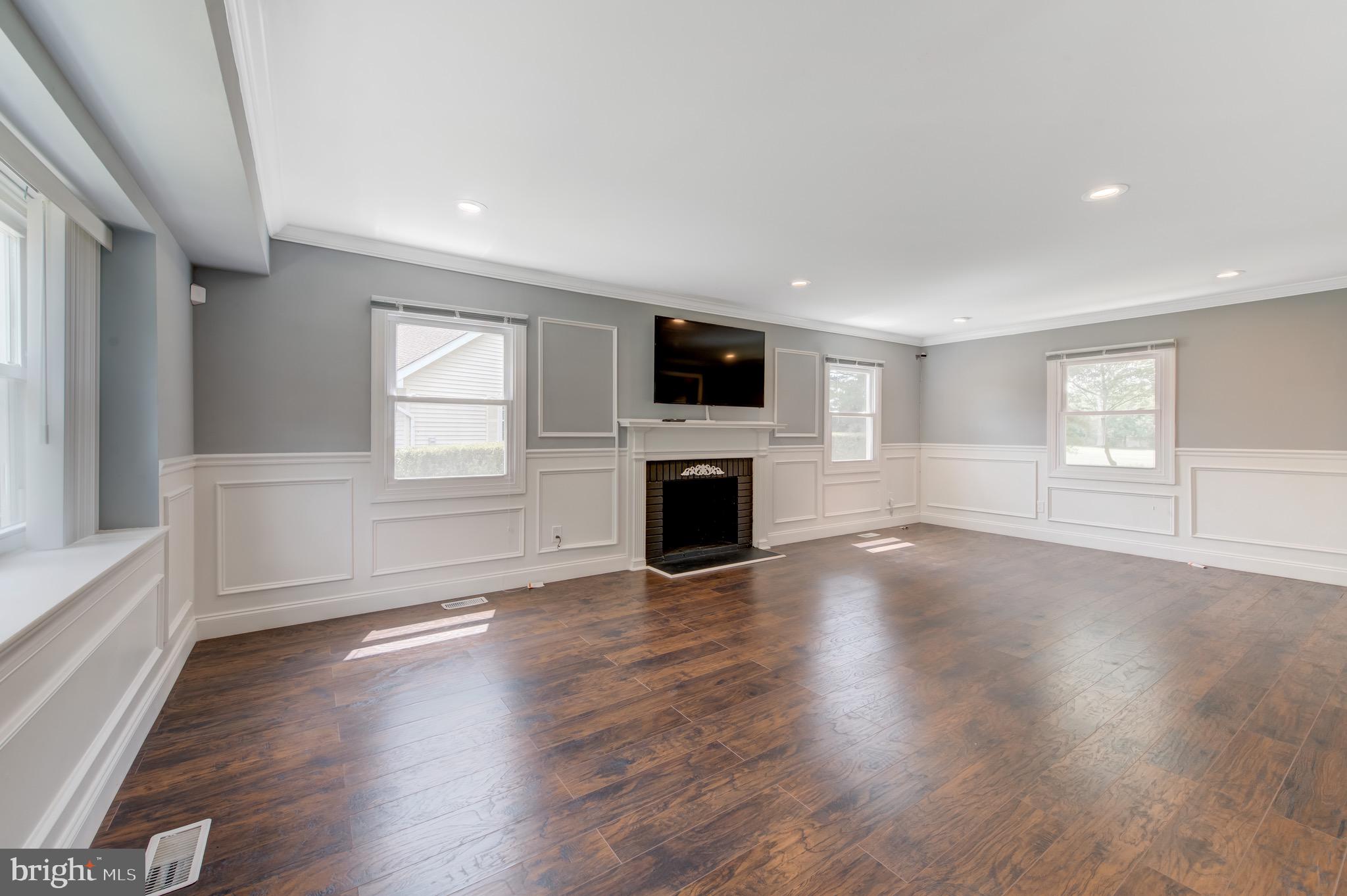 54 Country Club Road Willingboro, NJ 08046 - Photo 5 of 42 Livingroom with mounted TV over the fireplace