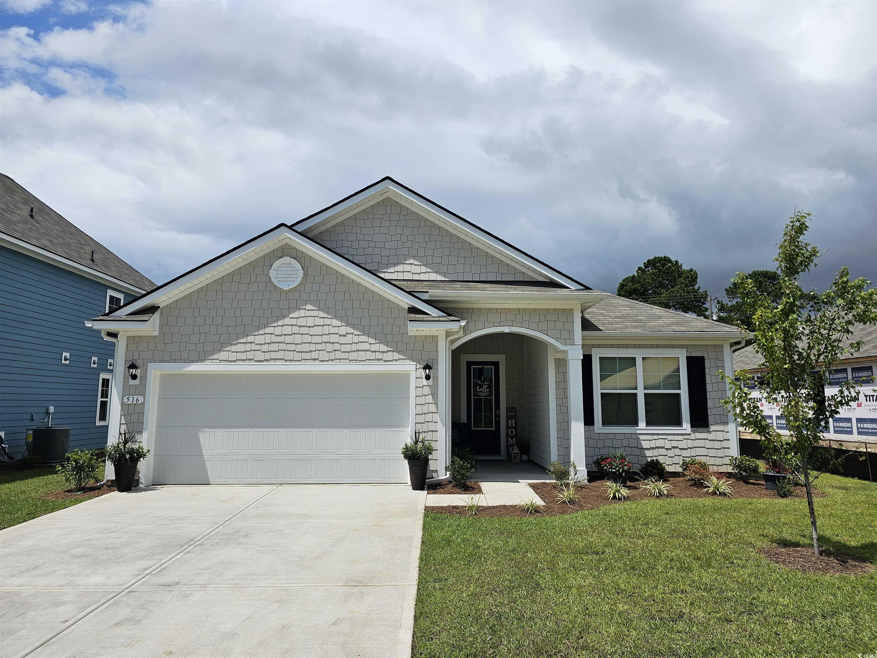 516 Haven View Way Murrells Inlet, SC 29576 - Photo 1 of 21 View of front of house featuring a garage, drivewa