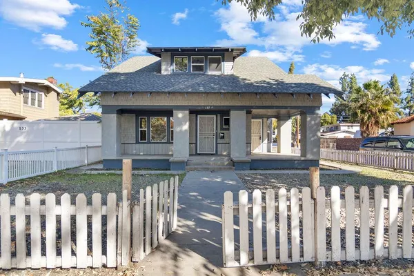 a front view of house with yard