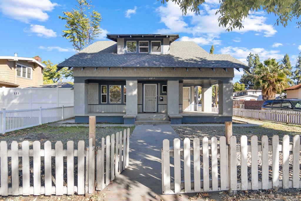 a front view of house with yard